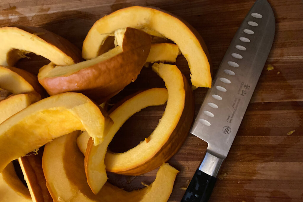 Pumpkin Slices on cutting board with knife