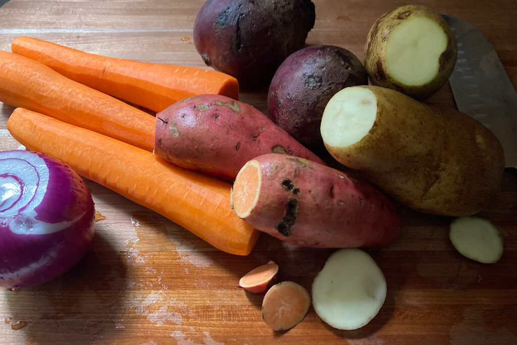 Root vegetables on cutting board