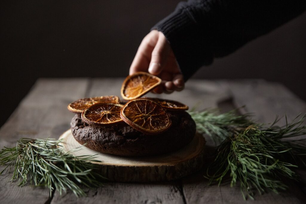 Stone-dried orange slices on chocolate cake