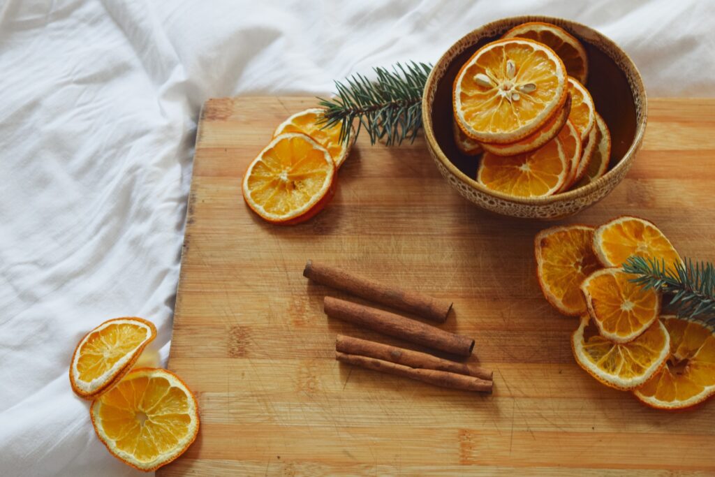 Bowl of dried oranges and cinnamon