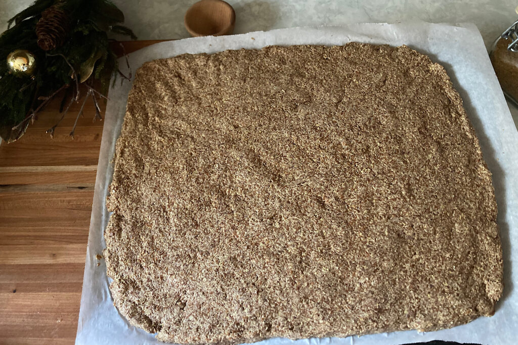 Rolled out dough on parchment paper