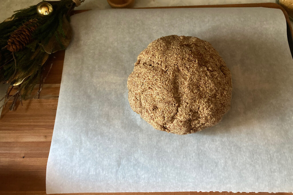 Dough ball on parchment paper