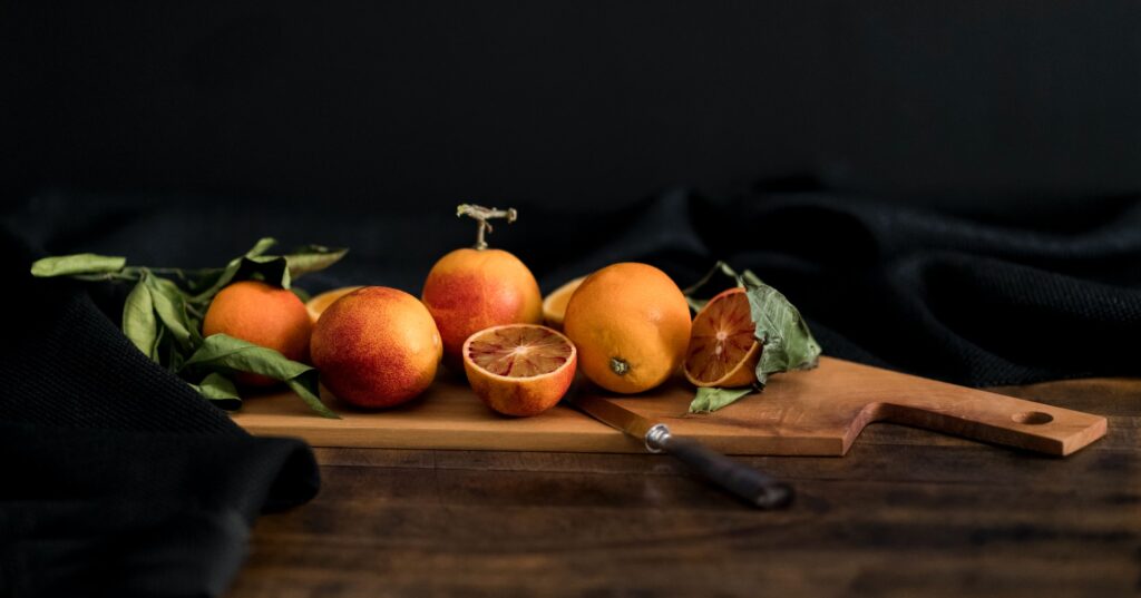 Sliced oranges on a cutting board