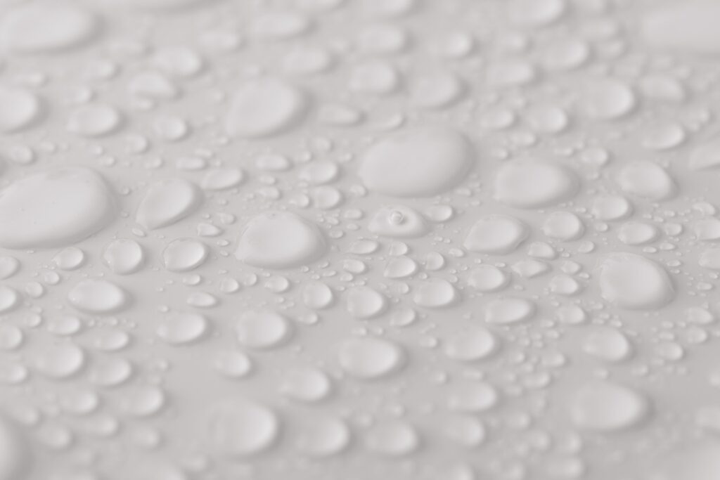 Droplets of Grain Alcohol Spray Sanitizer on Surface