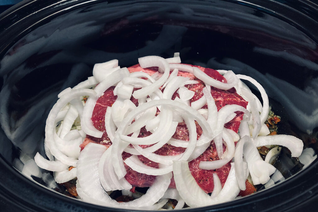 Onions and chuck roast in slow cooker