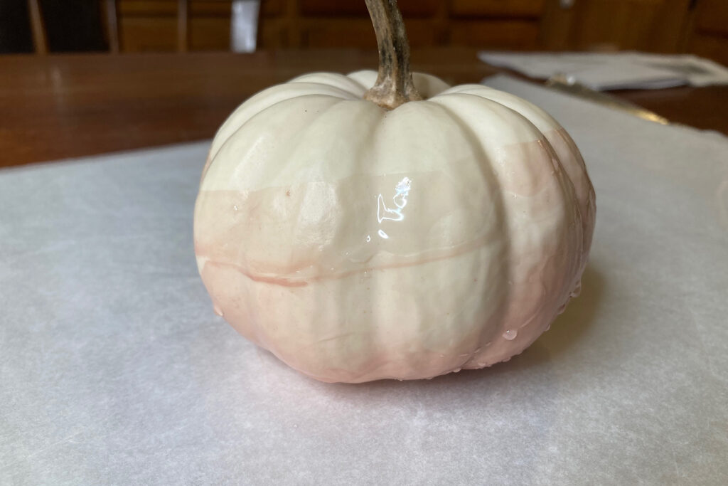 Buff colored nail enamel-dipped pumpkin.