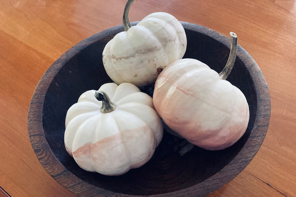 Enamel-Dipped pumpkins in bowl.