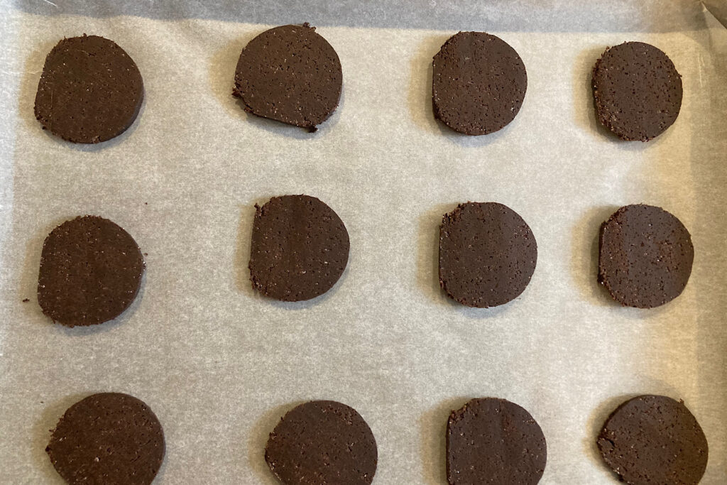 Chocolate Wafer Dough Rounds on Parchment