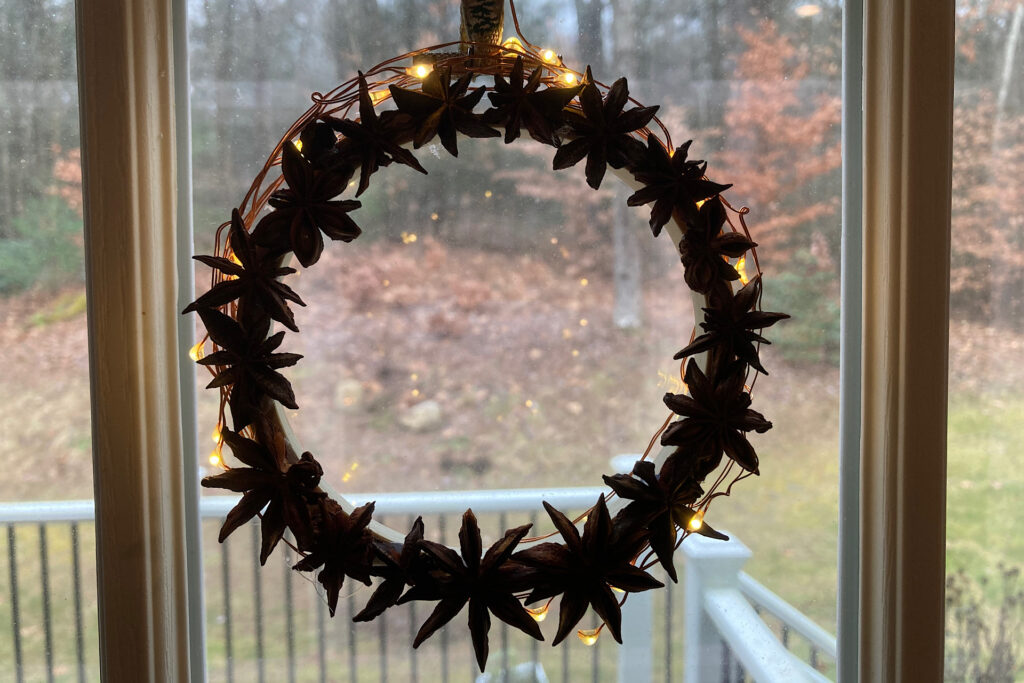 Anise Star Wreath Hung in Window Pane