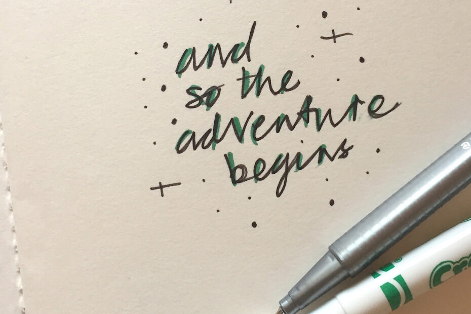 Hand written phrase and so the adventure begins