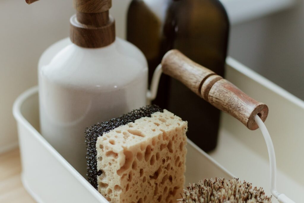 Cleaning kit tote with soaps, sponge and brush