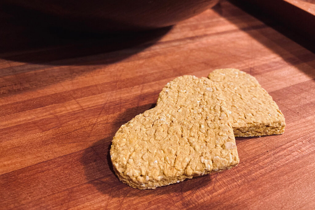 heart shaped horse treats on wooden board