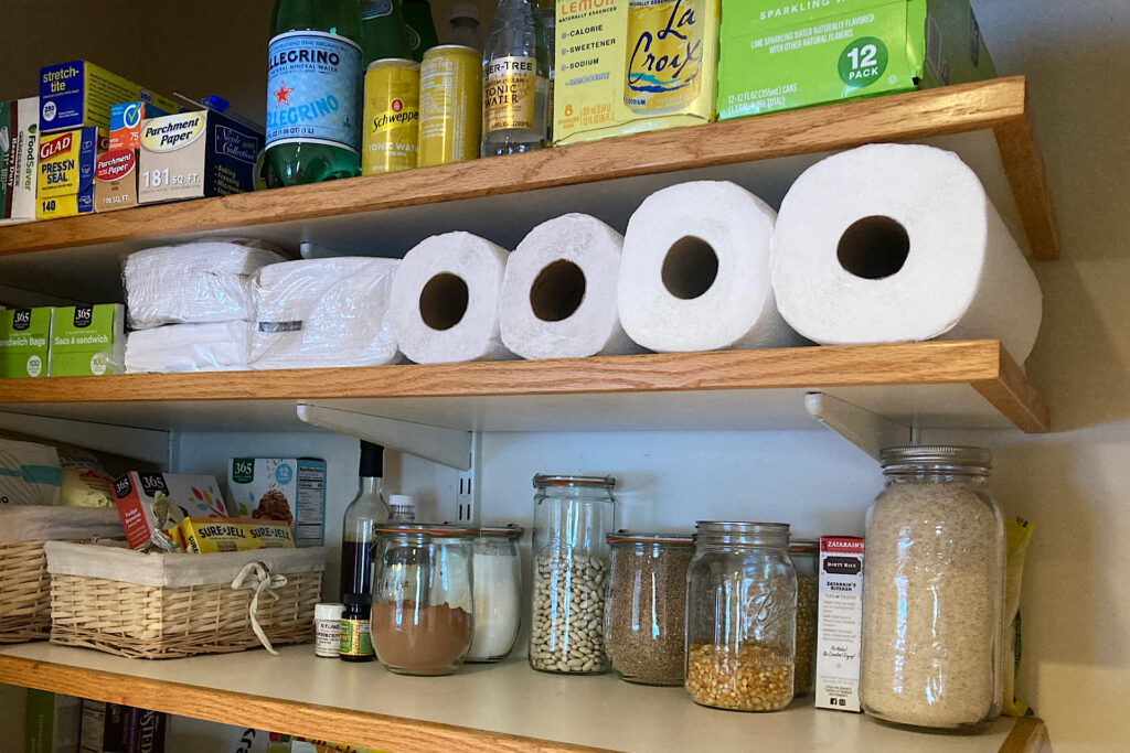 canned goods, paper and grains stored in pantry organization project