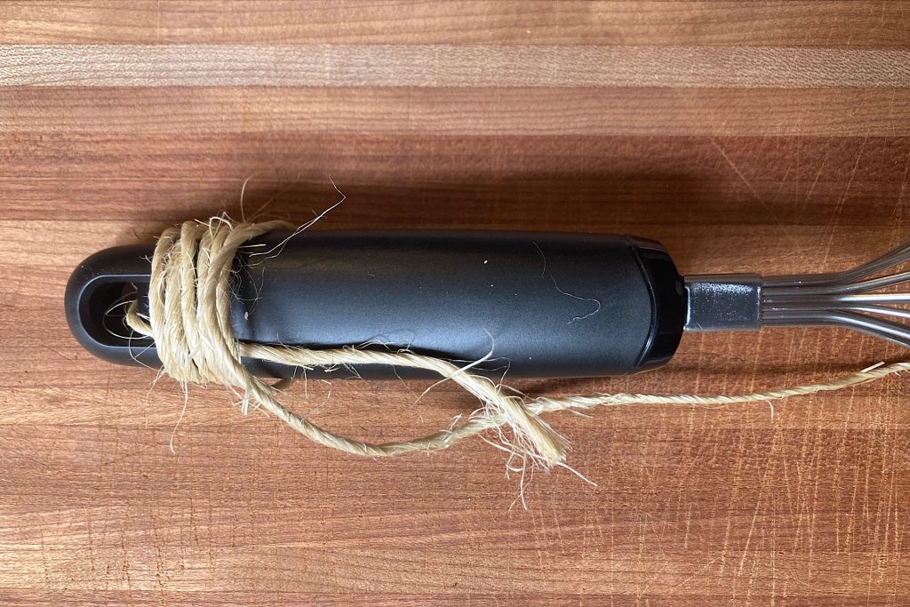 twine wrapped around whisk handle