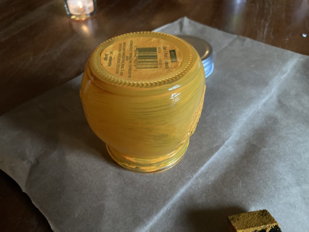 Finished first coat of paint on fall mason jar pumpkin lantern