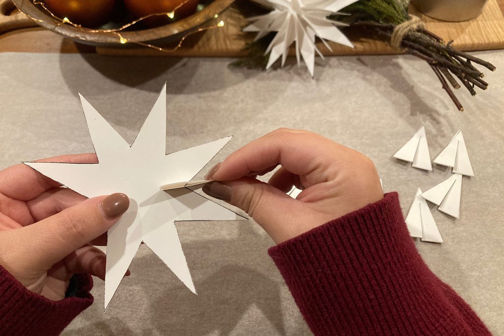 adding points to DIY white card stock holiday stars