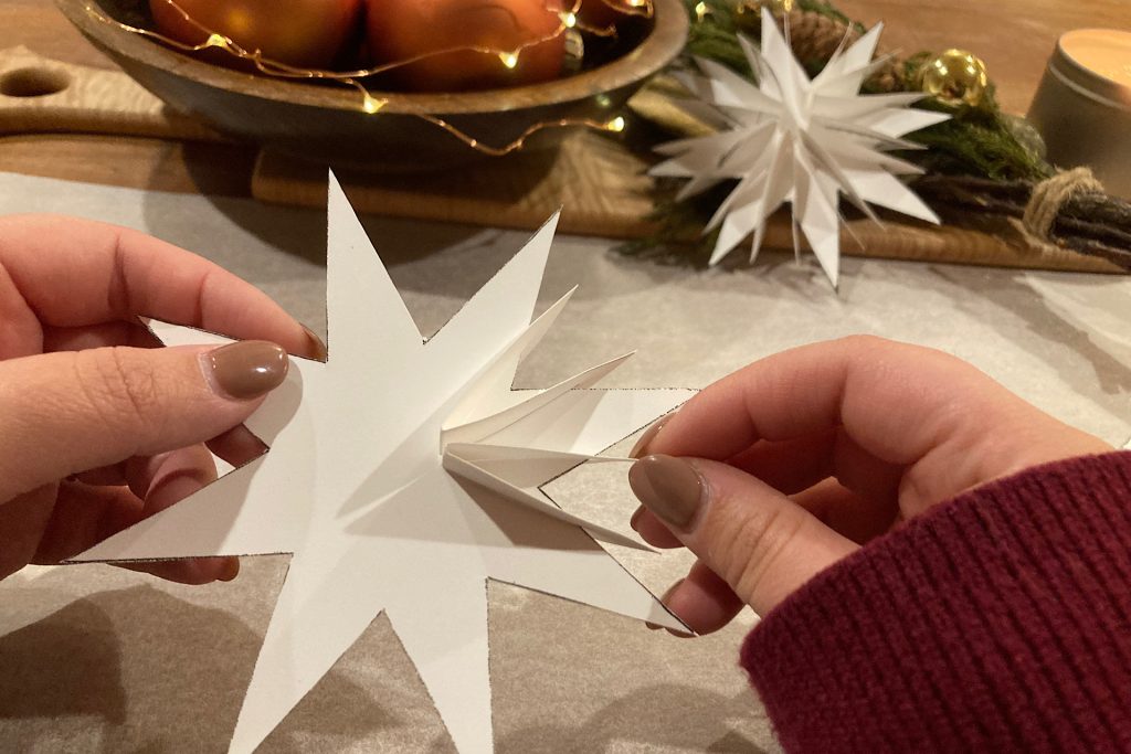 adjusting points on white card stock holiday stars