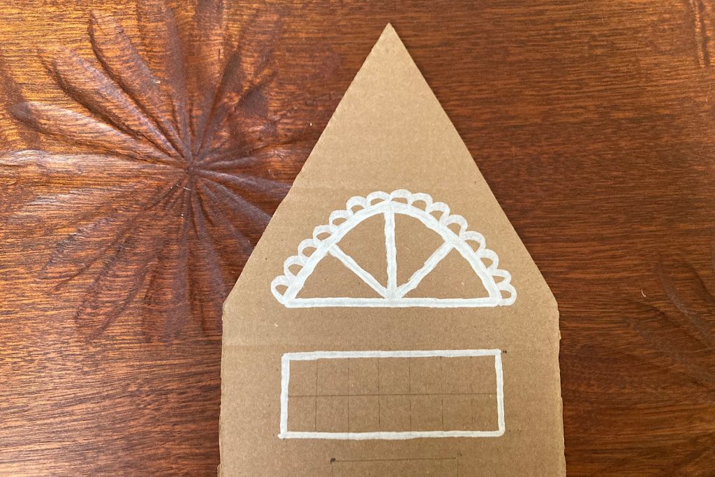 beginning detail on cardboard gingerbread house