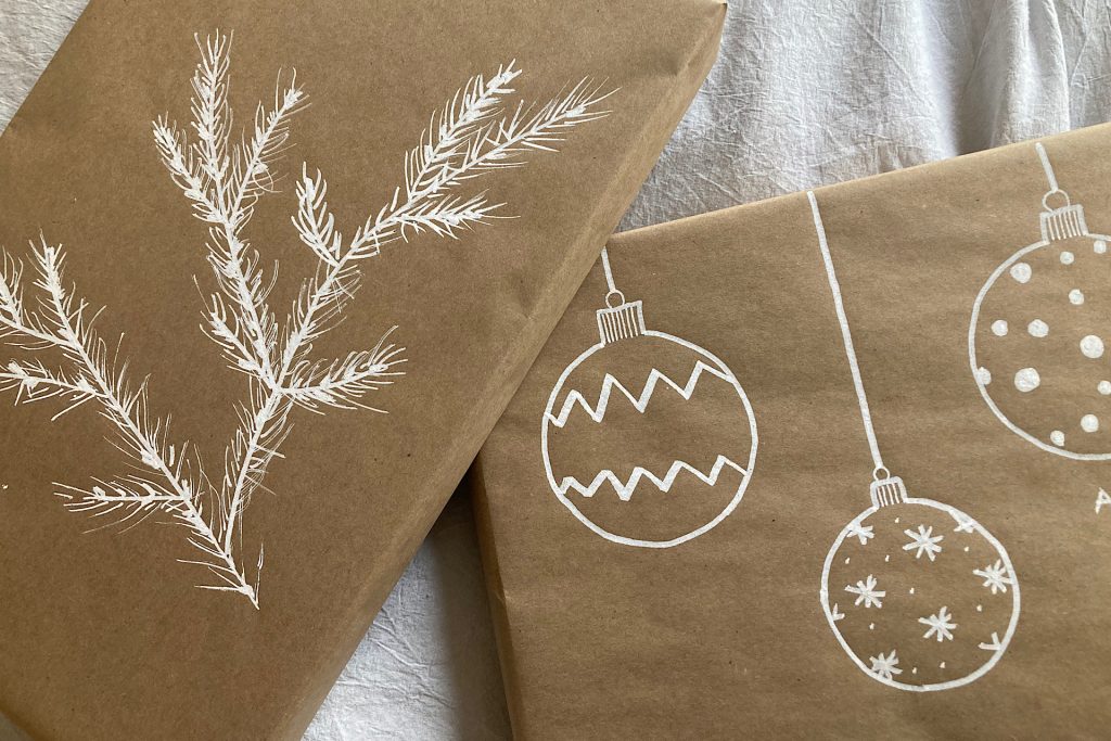 kraft paper gift wrap pine bough and ornaments