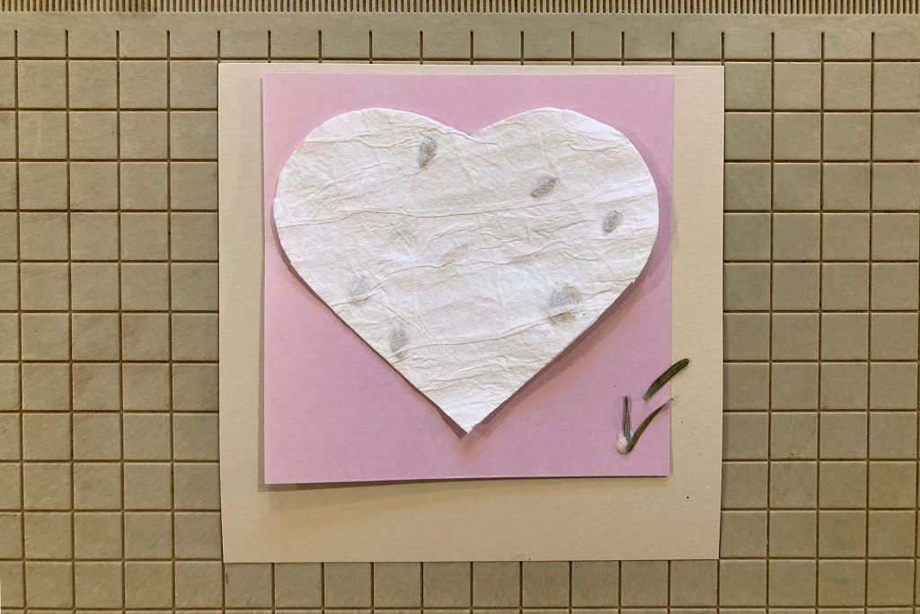 handmade valentine seed paper on pink cardstock