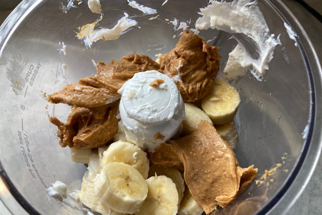 yogurt, bananas and peanut butter in blender