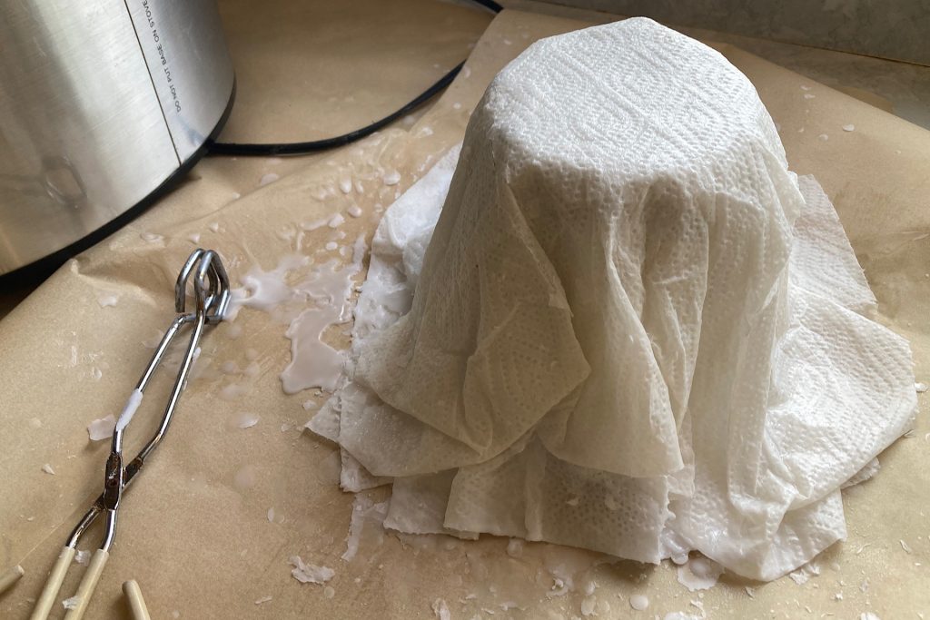 making DIY paperwhite planter with waxed paper towel sheets