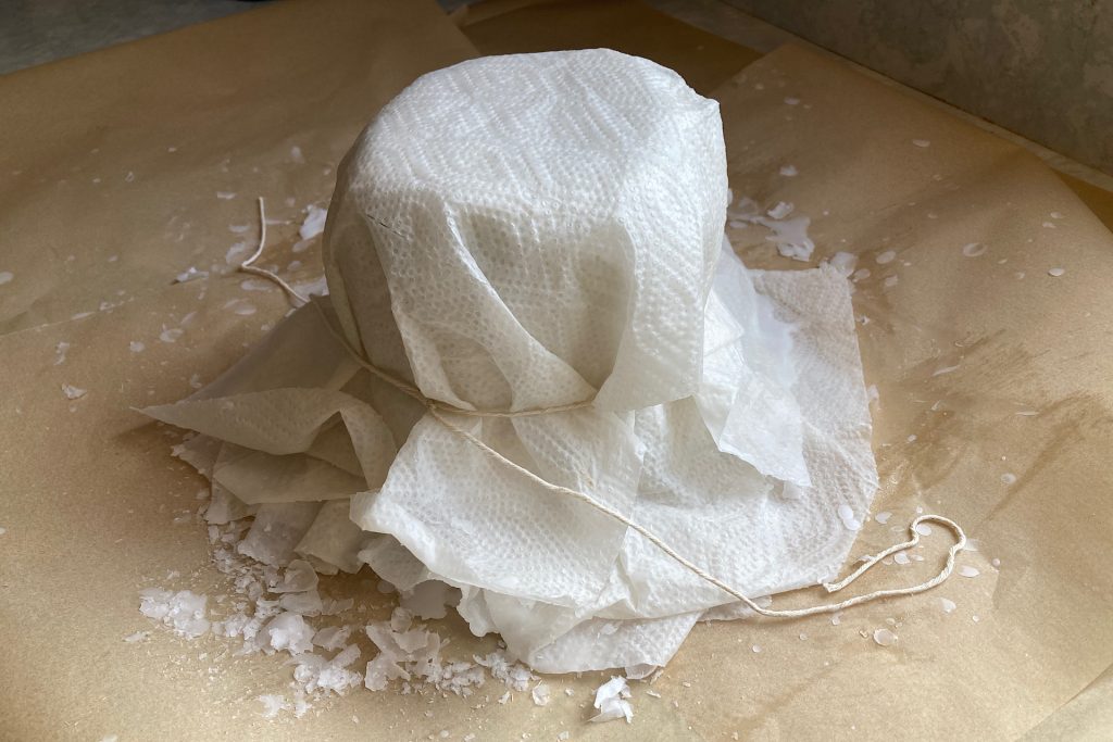 shaping waxed paper towels for over plastic pot