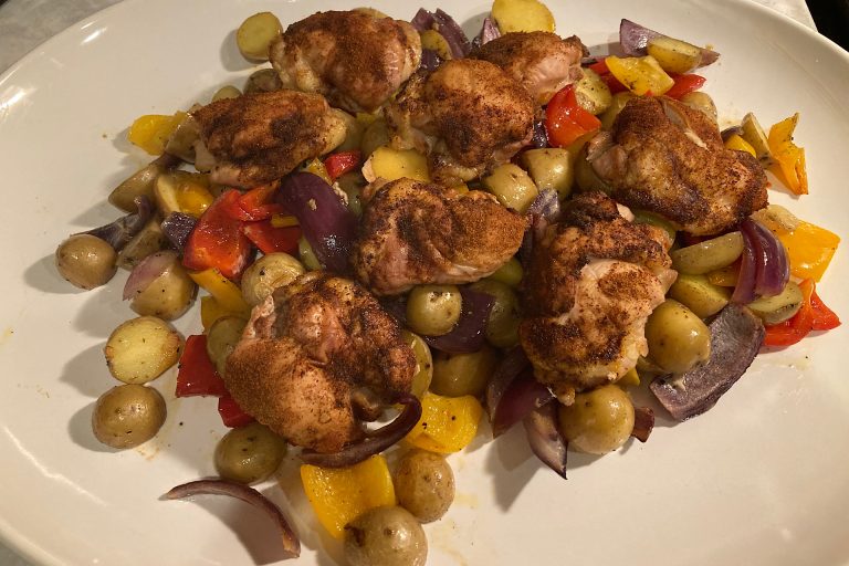 Sheet Pan Chicken Thighs Over Drip-Roasted Vegetables