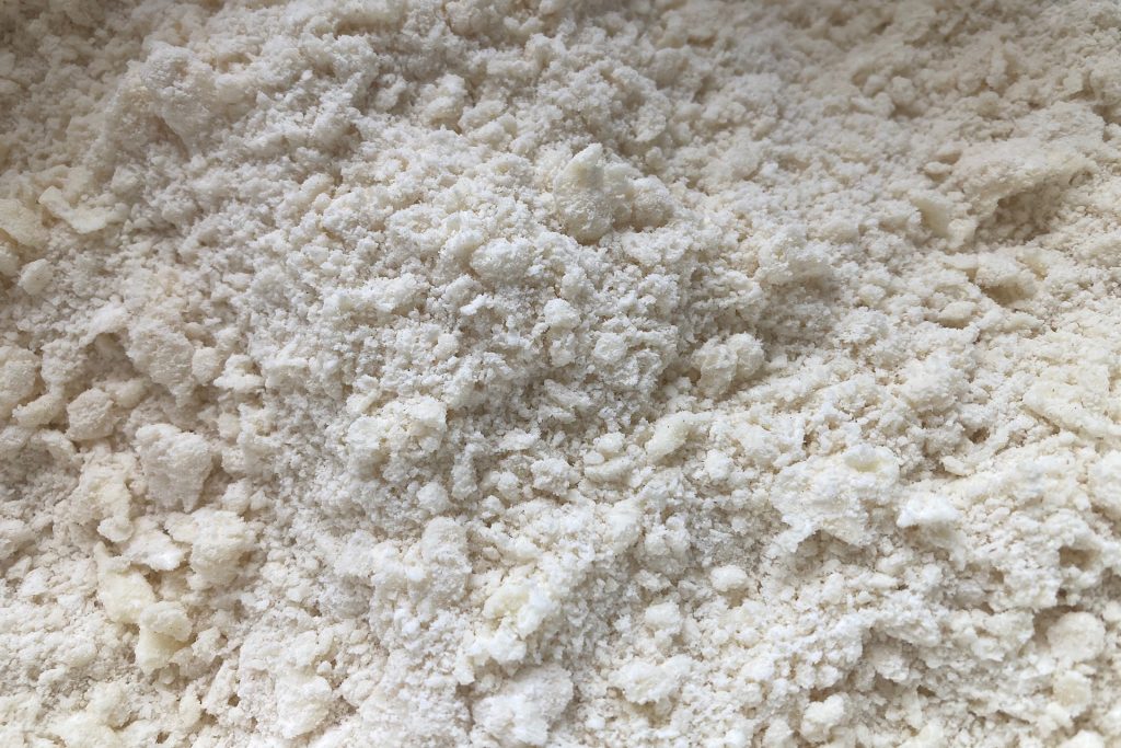 closeup of butter pie crust dry mixture