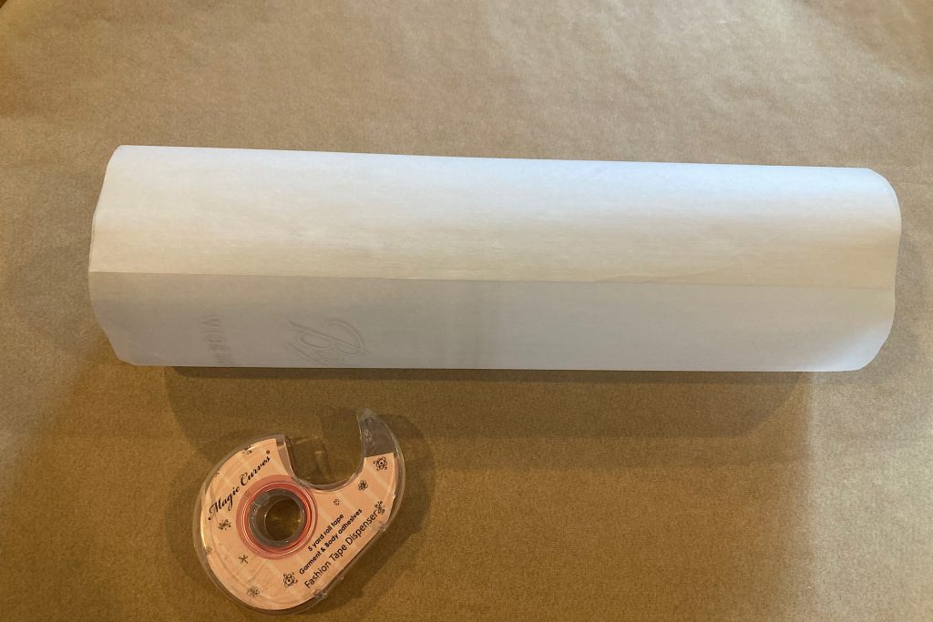 parchment paper tube sealed with double-sided tape