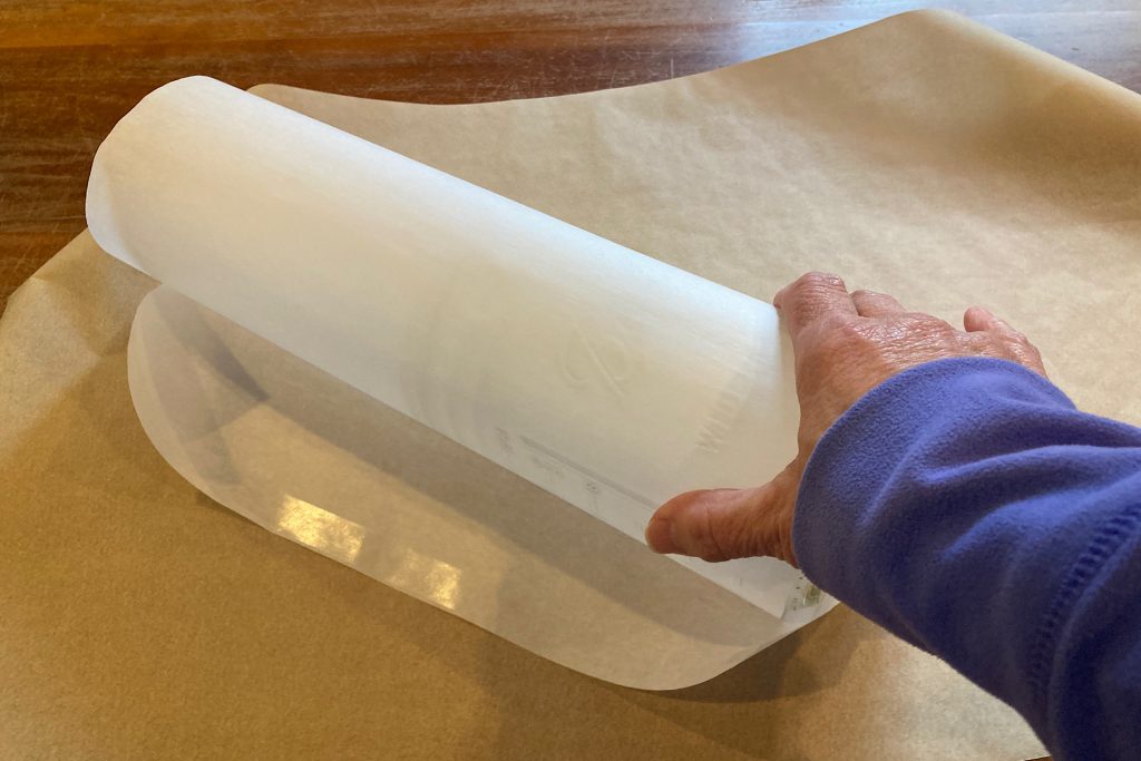 DIY parchment paper lanterns - rolling jar in paper