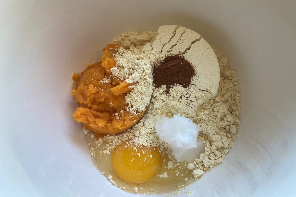 flour, sweet potato, coconut oil, egg & cinnamon in bowl