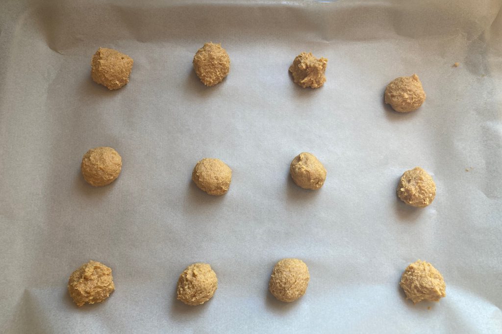 dough balls on parchment paper