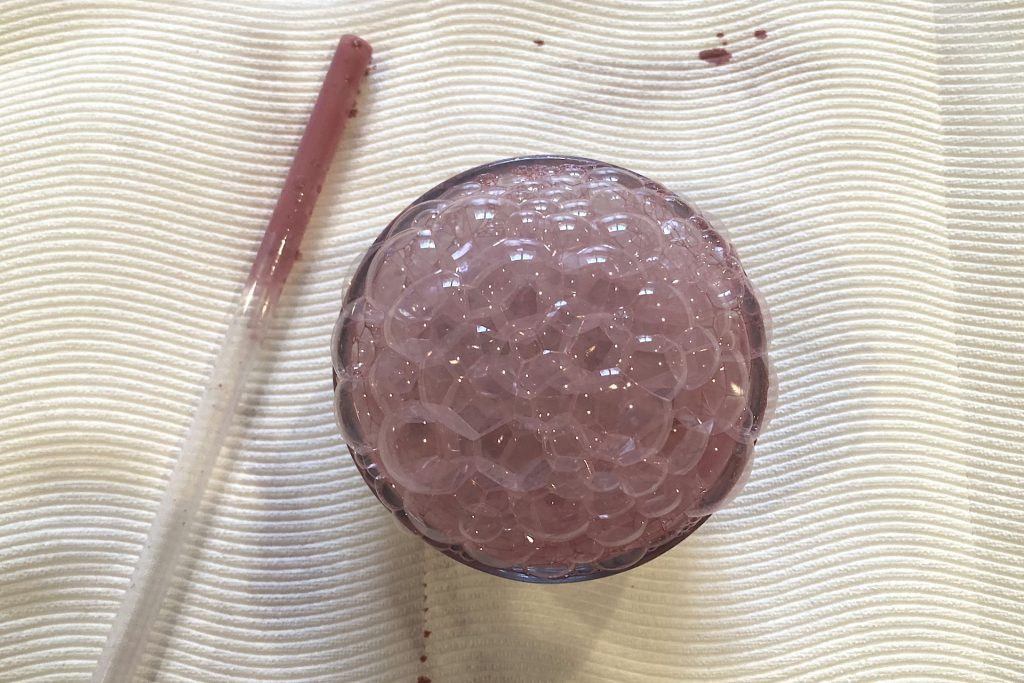 bubbles blown into acrylic paint, dish soap and water