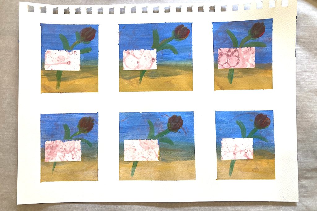 all painter's tape removed from rectangles of covered artwork