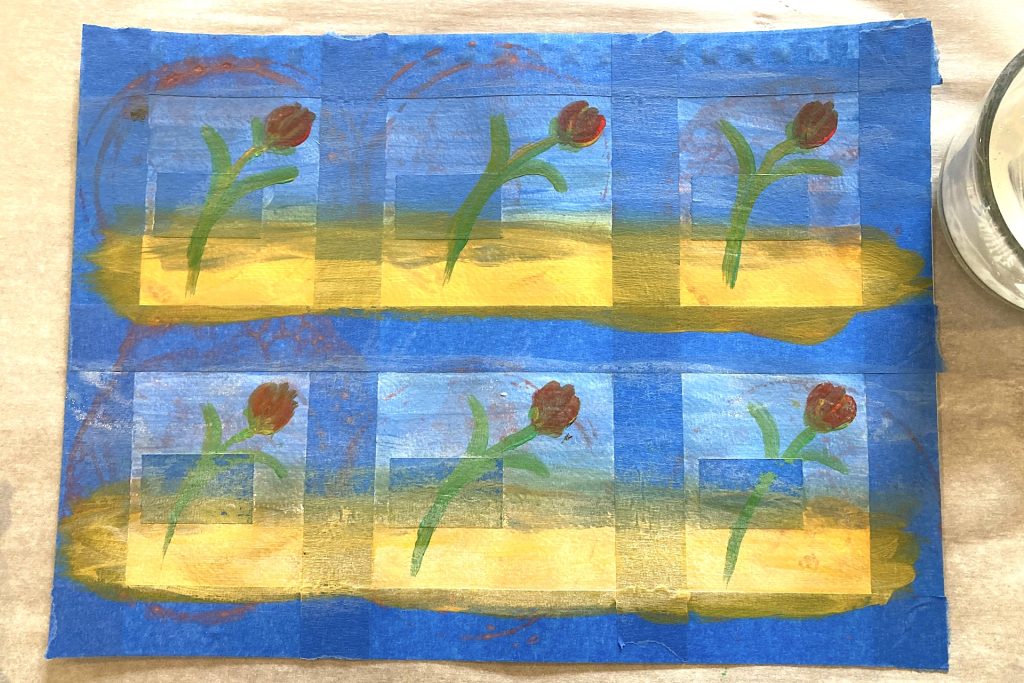 whitewashed red tulips painted on blue and yellow grid